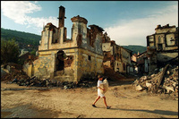 A boy heads away from Prizren's commercial district, past the remains of Serbian homes burned in retaliation for the ethnic cleansing campaign. - All images copyright Lisa Nipp 2010