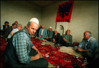 Relatives of a Kosovo Liberation Army fighter gather to mourn his death in the Hass region of southern Kosovo. The young man was arrested and killed by Serb prison guards in retaliation for a NATO bombing. - All images copyright Lisa Nipp 2010