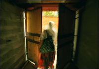 Early in the morning a Albanian woman heads off to work in the center of Prizren, where the streets still hold the potential for violence and unrest as those who have returned deal with their desire for revenge against the Serbs. - All images copyright Lisa Nipp 2010
